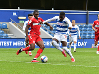 Bright Osayi-Samuel and Anfernee Dijksteel in action during the Sky Bet Championship match between Queens Park Rangers and Middlesbrough at...