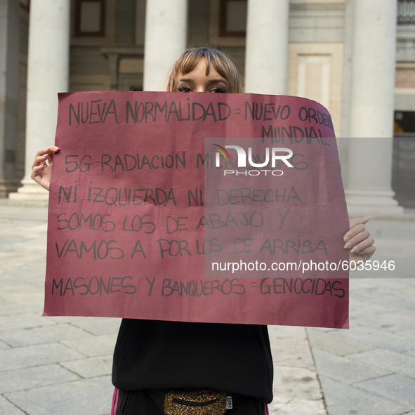 Dozens of people protesting against new normality and New World Order conspiracy theory during the coronavirus (COVID-19) crisis in Madrid S...