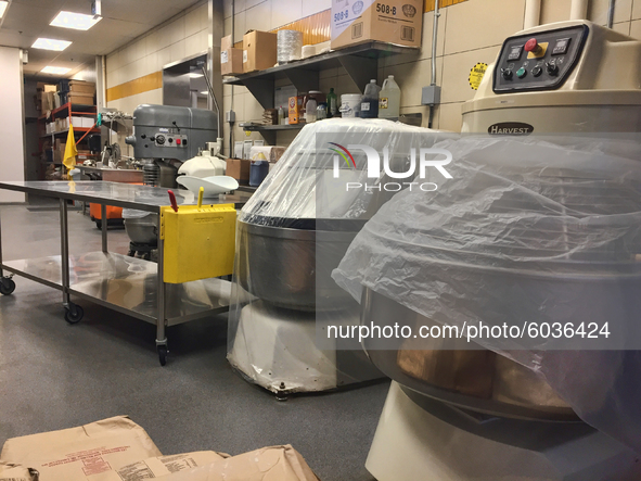 Industrial mixers and other equipment in a large bakery in Toronto, Ontario, Canada. 