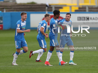  Barrow's Mike Jones celebrates with his team mates scoring the equalising goal during the Sky Bet League 2 match between Barrow and Colches...