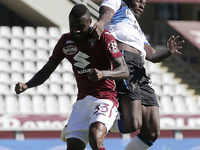 Duvan Zapata of Atalanta BC competes for the ball with Nicolas Nkoulou of Torino FC during the Serie A match between Torino FC and Atalanta...