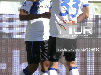 Luis Muriel of Atalanta BC celebrates with Hans Hateboer of Atalanta BC after scoring the goal  during the Serie A match between Torino FC a...