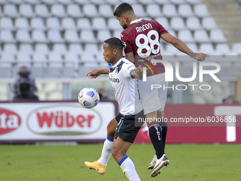 Tomas Rincon of Torino FC competes for the ball with Luis Muriel of Atalanta BC during the Serie A match between Torino FC and Atalanta BC a...