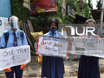 Calcutta Tram Users Association, school and college students organized a silent protest for preservation of only pollution free vehicle, old...