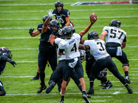 Army quarterback Christian Anderson (4) passes the ball during an NCAA college football game at Nippert Stadium between the University of Ci...