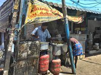 Man selling snacks along the roadside in Kottar, Nagercoil, Tamil Nadu, India on February 12, 2020. (