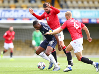   Emile Acquah of Southend United holding off Alex Kenyon of Morecambe  during the Sky Bet League 2 match between Southend United and Moreca...