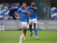 Hirving Lozano of SSC Napoli celebrates after scoring with Victor Osimhen of SSC Napoli during the Serie A match between SSC Napoli and Geno...
