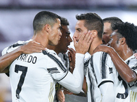 Cristiano Ronaldo of Juventus FC celebrates with Rodrigo Bentancur of Juventus FC scoring second goal during the Serie A match between AS Ro...