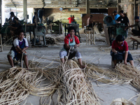 A number of workers prepare rattan used as material to make coffin crafts at Transan Village, Sukoharjo Regency, Central Java Province, Indo...