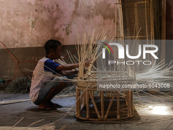 A workers make coffin crafts from rattan at Transan Village, Sukoharjo Regency, Central Java Province, Indonesia on September 29, 2020. The...