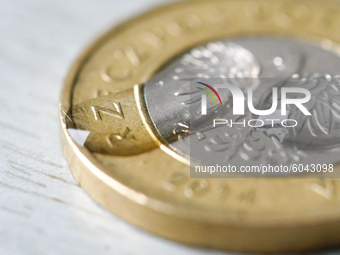 A Polish two zloty coin is seen in this photo illustration in Warsaw, Poland on September 29, 2020. The Polish zloty currency has seen it's...