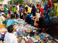 People are seen shopping on a street in Dhaka, Bangladesh on September 29, 2020. (