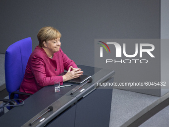 Chancellor Angela Merkel (CDU) speaks during the general debate on the federal budget in the Bundestag in Berlin, Germany, on September 30,...