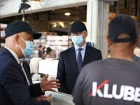 French Economy Minister Bruno Le Maire (C), accompanied by Julien Bourrellis (L), Klubb Group CEO visits  the Klubb aerial platform producti...