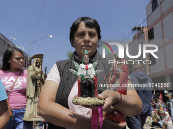 A follower of La Santa Muerte, also known as ''Nina Blanca'', she visited her temple located on Calle Alfareria, Tepito, to thank her for th...
