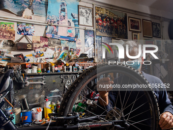 The work of small and medium artisans during the coronavirus emergency, in their small shops.
In the photo a bicycle maker , in Rieti, Italy...