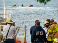 Small plane crash into a pier near Beechhurst Yacht Club in Whitestone Queens, United States, on October 4, 2020. (