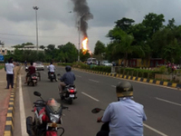 Fire broke out and fire fighters rush to douse the fire after explosion at the CNG gas filling tank at a fuel filling station in the eastern...