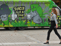 A lady walks by a Burger Van restaurant in Sofia center. 
The number of people infected with COVID-19 in Bulgaria is increasing, with the hi...