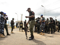 Men of the Nigerian Police force on ground to safe guard sensitive electoral materials to various local government areas, during the distrib...