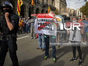 Demonstrators against Felipe VI during a protest against the visit of King Felipe VI of Spain to Catalonia, in Barcelona, Spain on October 9...