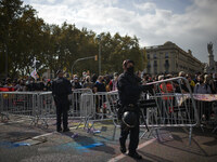 Agents of the Mossos d'Esquadra remove the fences from the Estacion de Francia, fenced off for the visit of Felipe VI during a protest again...