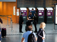 The police ask for identification documents at the Atocha train station, in Madrid, Spain, on October 09, 2020, after the entry into force o...