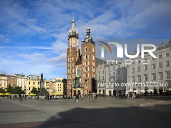 A view over St. Mary's Basilica at the Main Square during coronavirus pandemic. Krakow, Poland on October 9th, 2020. Due to the increasing s...