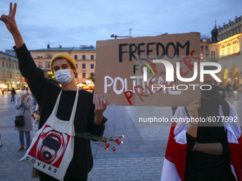 People demonstrate at the Main Square in solidarity with Belarus. Krakow, Poland on October 10, 2020. Belarusians living in Krakow and suppo...