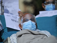 Dr. Govinda KC arrive to ends 19th hunger strike on 28th day on Sunday, October 11, 2020 by drinking juice from a sanitation staffer Bikash...