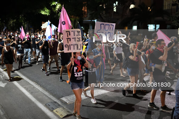 Israelis protest against Israeli prime minister Benjamin Netanyahu and coronavirus lockdown measures in Tel Aviv on October 10, 2020.  