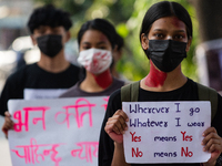 Nepalese youths stage a protest and a drama against rape in Kathmandu Nepal on October 12, 2020.  (