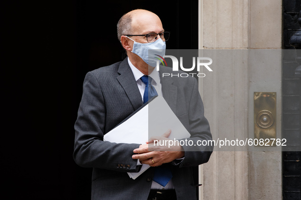 Stephen Powis, National Medical Director of NHS England, wears a face mask leaving 10 Downing Street in London, England, on October 12, 2020...