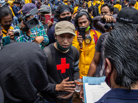 College students held a rally against the Omnibus Law outside Regional People's Representative Assembly building in Magelang, Central Java,...