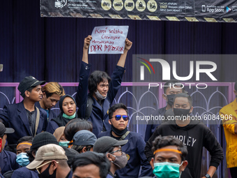 College students held a rally against the Omnibus Law outside Regional People's Representative Assembly building in Magelang, Central Java,...