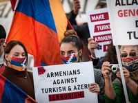 Demonstrators of the Armenian people hold banners in Montecitorio Square, Rome, Italy, on October 13, 2020 to demand the Azeri ceasefire in...