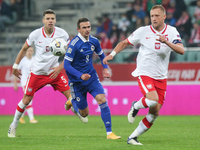 Jan Bednarek (POL),Smail Prevljak (BiH),Kamil Glik (POL) during the UEFA Nations League group stage match between Poland and Bosnia-Herzegov...