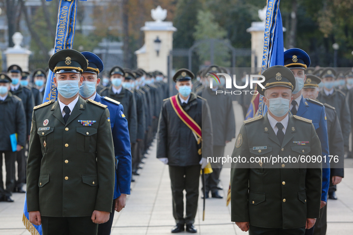 Future army officers stand lined up before the oath ceremony at the official ceremonial residence of the President of Ukraine Mariyinsky Pal...