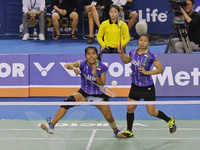 South Korea's Chang Ye Na and her teammate Lee So Hee play match during their women's double final match against Indonesia's Nitya Krishinda...