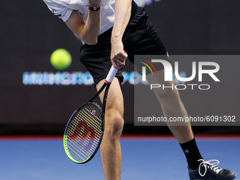 Ugo Humbert of France serves the ball during his ATP St. Petersburg Open 2020 international tennis tournament match against Andrey Rublev of...