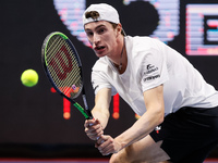 Ugo Humbert of France returns the ball to Andrey Rublev of Russia during their ATP St. Petersburg Open 2020 international tennis tournament...