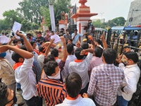 Akhil Bharatiya Vidyarthi Parishad (ABVP) members protest against the state government for the women safety and law issues outside the Rajas...