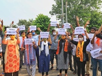 Akhil Bharatiya Vidyarthi Parishad (ABVP) members protest against the state government for the women safety and law issues outside the Rajas...