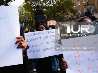 Activists protesting police brutality by the Nigerian Special Anti-Robbery Squad (SARS) demonstrate on Whitehall in London, England, on Octo...