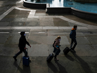 People walk in Trafalgsar Square as  London prepares for a tier-2 lockdown due to the COVID-19 outbreak, London on October 15, 2020. The Cap...