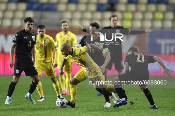 Ionut Mitrita of Romania in action against Stefan Ilsanker of Austria of UEFA Nations League football match in Ploiesti city October 14, 202...
