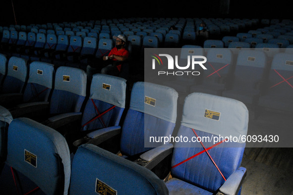 Social distancing marks inside a movie theater in Kolkata, India, on October 16, 2020. Cinema halls are permitted to open with 50 % audience...