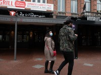 People of Eindhoven passing infront of closed cafes and bars during the partial lockdown and daily life in Eindhoven city in the Netherlands...
