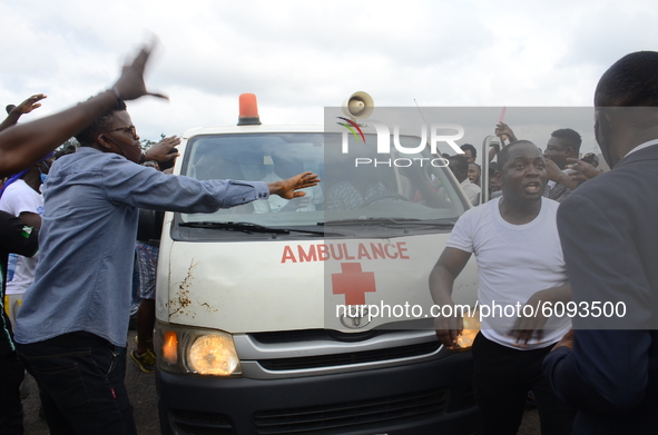 End Sars Protester block a hospital bus from passing through the ongoing protest, as youth continue to barricade of Lagos - Ibadan expresswa...